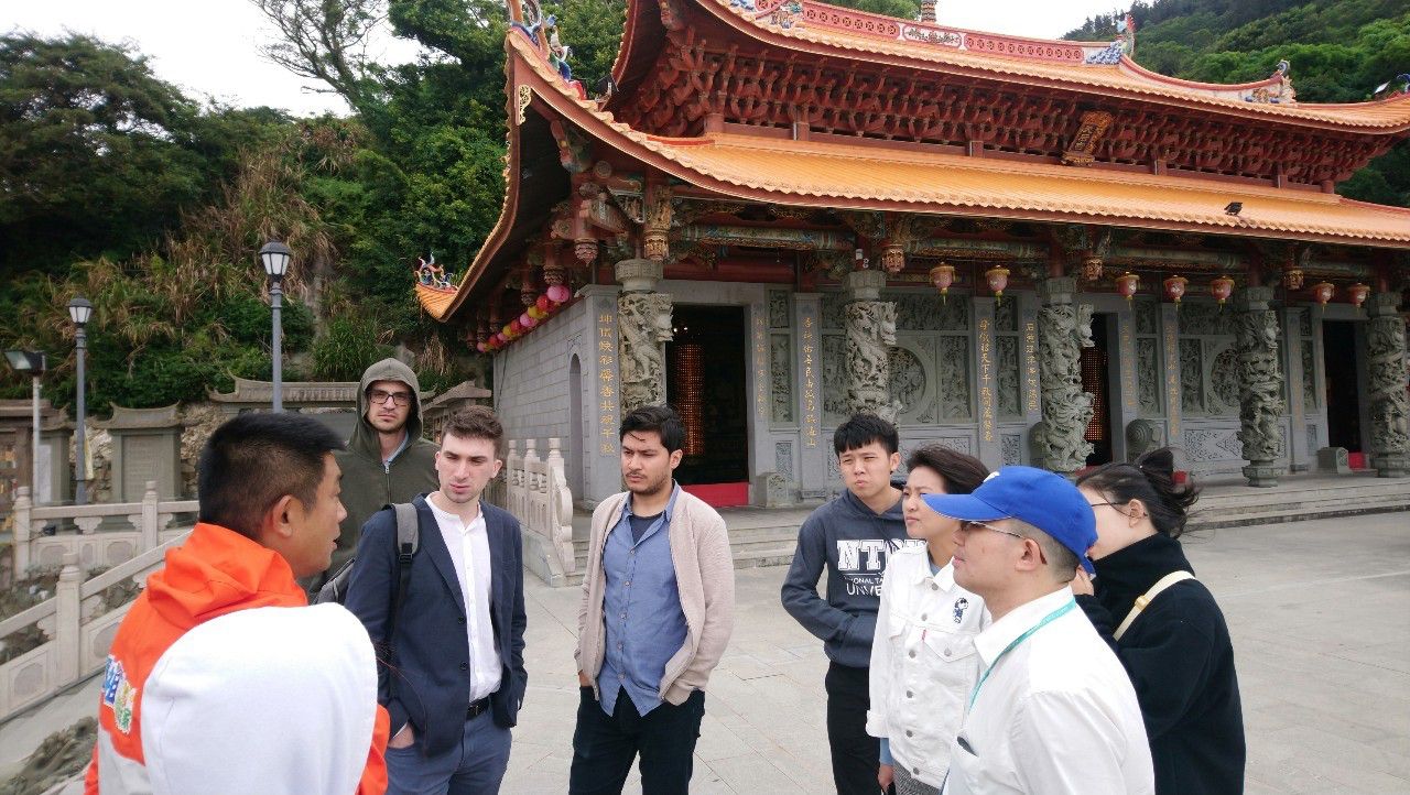 Listening to the history of Matsu Temple.